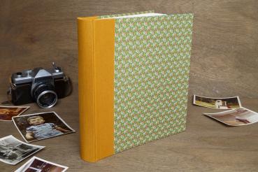green yellow photo album of Papeterie Schreibweise